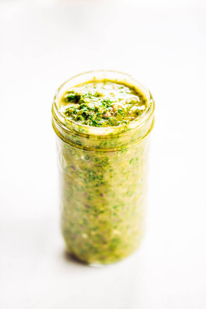 Zesty, fresh, and flavorful, cilantro garlic chimichurri with jalapeno pepper. Perfect for marinating chicken, beef, or topping off sweet potato fries and salads! Made easy in the blender in five minutes. Paleo, gluten free, and whole30 friendly. Easy whole30 dinner recipes. Whole30 recipes. Whole30 lunch. Whole30 recipes just for you. Whole30 meal planning. Whole30 meal prep. Healthy paleo meals. Healthy Whole30 recipes. Easy Whole30 recipes