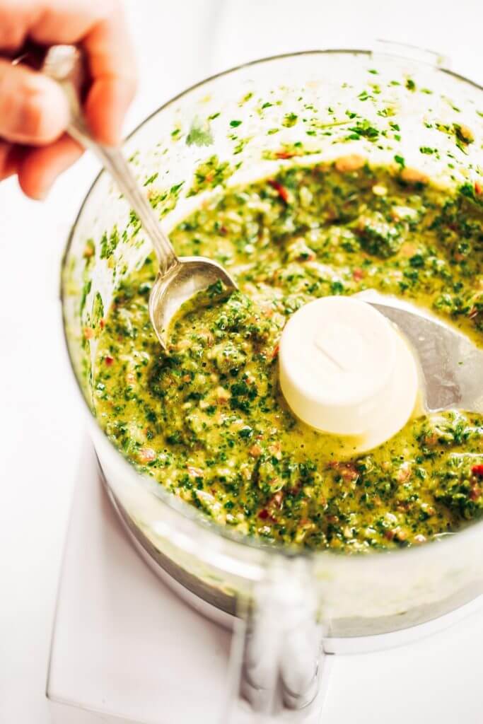 Zesty, fresh, and flavorful, cilantro garlic chimichurri with jalapeno pepper. Perfect for marinating chicken, beef, or topping off sweet potato fries and salads! Made easy in the blender in five minutes. Paleo, gluten free, and whole30 friendly. Easy whole30 dinner recipes. Whole30 recipes. Whole30 lunch. Whole30 recipes just for you. Whole30 meal planning. Whole30 meal prep. Healthy paleo meals. Healthy Whole30 recipes. Easy Whole30 recipes