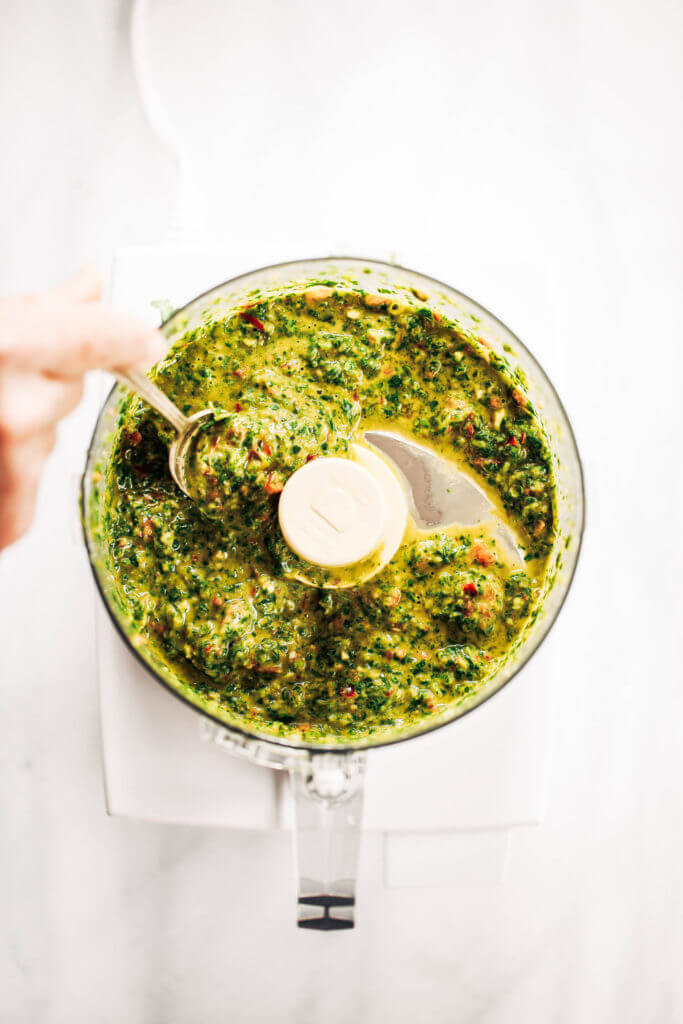 Zesty, fresh, and flavorful, cilantro garlic chimichurri with jalapeno pepper. Perfect for marinating chicken, beef, or topping off sweet potato fries and salads! Made easy in the blender in five minutes. Paleo, gluten free, and whole30 friendly. Easy whole30 dinner recipes. Whole30 recipes. Whole30 lunch. Whole30 recipes just for you. Whole30 meal planning. Whole30 meal prep. Healthy paleo meals. Healthy Whole30 recipes. Easy Whole30 recipes