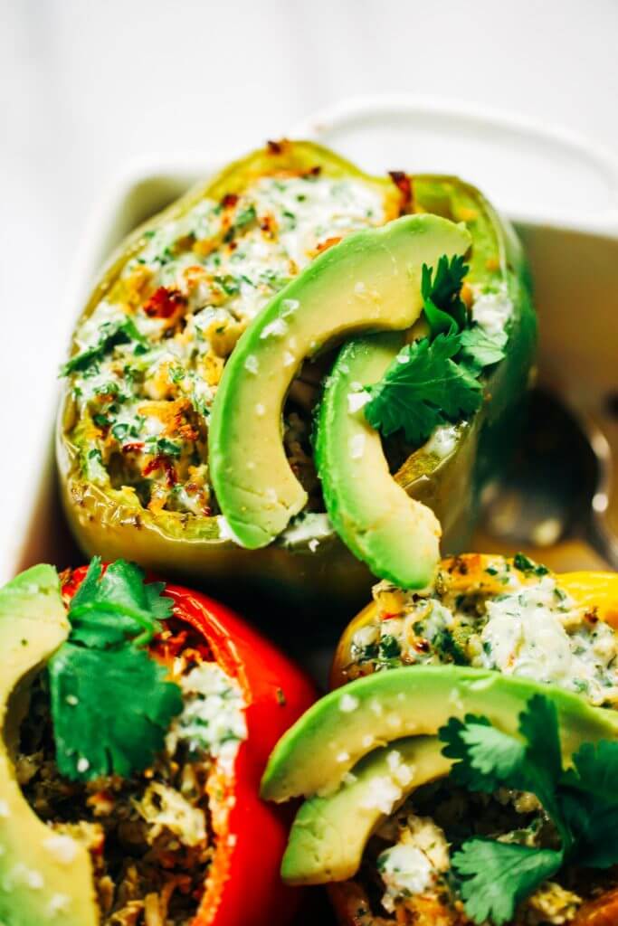 Ranch stuffed bell peppers. A quick whole30 and paleo meal for the whole family! Stuffed with cauliflower rice, shredded chicken, spicy jalapeno and cilantro sauce. Easy whole30 dinner recipes. Easy whole30 dinner recipes. Whole30 recipes. Whole30 lunch. Whole30 meal planning. Whole30 meal prep. Healthy paleo meals. Healthy Whole30 recipes. Easy Whole30 recipes. Easy whole30 dinner recipes.