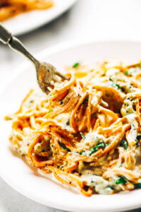 Whole30 creamy carrot noodle alfredo- made with vegan cashew cheese sauce. Whole30, paleo, and dairy free. An easy healthy family recipe everyone will love. Perfect for meal prep; can be made ahead and frozen- pulled out at your convenience! Easy whole30 dinner recipes. Whole30 recipes. Whole30 lunch. Whole30 recipes just for you. Whole30 meal planning. Whole30 meal prep. Healthy paleo meals. Healthy Whole30 recipes. Easy Whole30 recipes