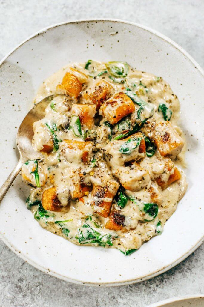 This is the most delicious! 2 Ingredient Paleo Sweet Potato Gnocchi in Spinach Cream Sauce. This recipe can be made ahead and frozen. Easy whole30 dinner recipes. Easy whole30 dinner recipes. Whole30 recipes. Whole30 lunch. Whole30 meal planning. Whole30 meal prep. Healthy paleo meals. Healthy Whole30 recipes. Easy Whole30 recipes. Easy whole30 dinner recipes.
