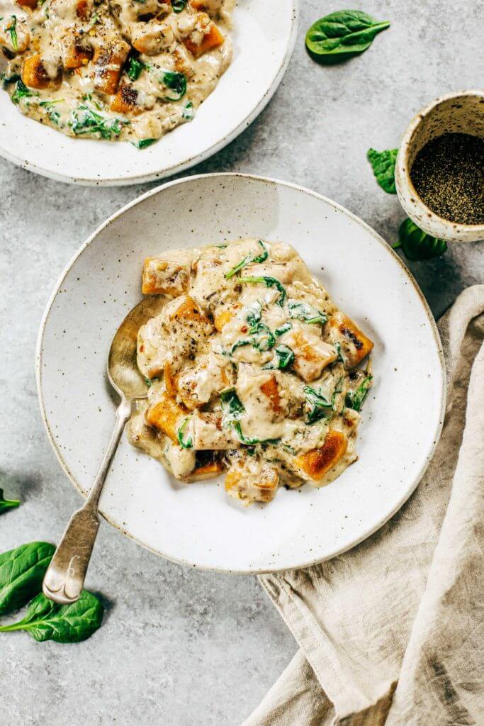 This is the most delicious! 2 Ingredient Paleo Sweet Potato Gnocchi in Spinach Cream Sauce. This recipe can be made ahead and frozen. Easy whole30 dinner recipes. Easy whole30 dinner recipes. Whole30 recipes. Whole30 lunch. Whole30 meal planning. Whole30 meal prep. Healthy paleo meals. Healthy Whole30 recipes. Easy Whole30 recipes. Easy whole30 dinner recipes.