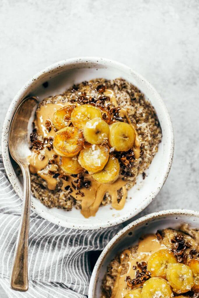 Warm and toasty Paleo banana cereal. Made with caramelized bananas, chia seeds, golden flax, hemp, and coconut. This grain free cereal tastes like oatmeal and is topped with my favorite caramelized bananas! Paleo, gluten free, healthy. Whole30 breakfast recipe. Easy paleo breakfast ideas. Whole30 breakfast ideas. paleo cereal recipe. whole30 meal plan.h. Whole30 meal planning. Whole30 meal prep. Healthy paleo meals. Healthy Whole30 recipes. Easy Whole30 recipes.