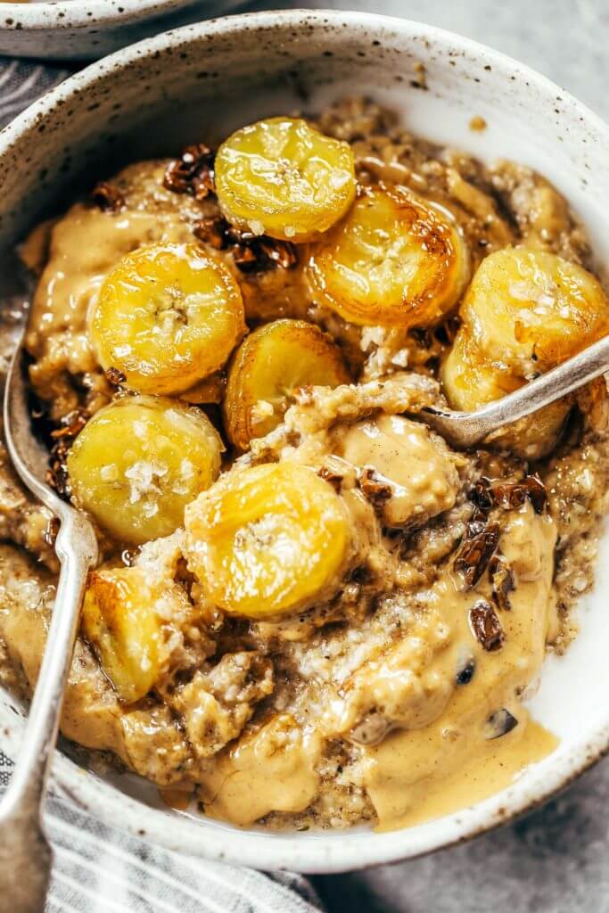 Warm and toasty Paleo banana cereal. Made with caramelized bananas, chia seeds, golden flax, hemp, and coconut. This grain free cereal tastes like oatmeal and is topped with my favorite caramelized bananas! Paleo, gluten free, healthy. Whole30 breakfast recipe. Easy paleo breakfast ideas. Whole30 breakfast ideas. paleo cereal recipe. whole30 meal plan.h. Whole30 meal planning. Whole30 meal prep. Healthy paleo meals. Healthy Whole30 recipes. Easy Whole30 recipes.