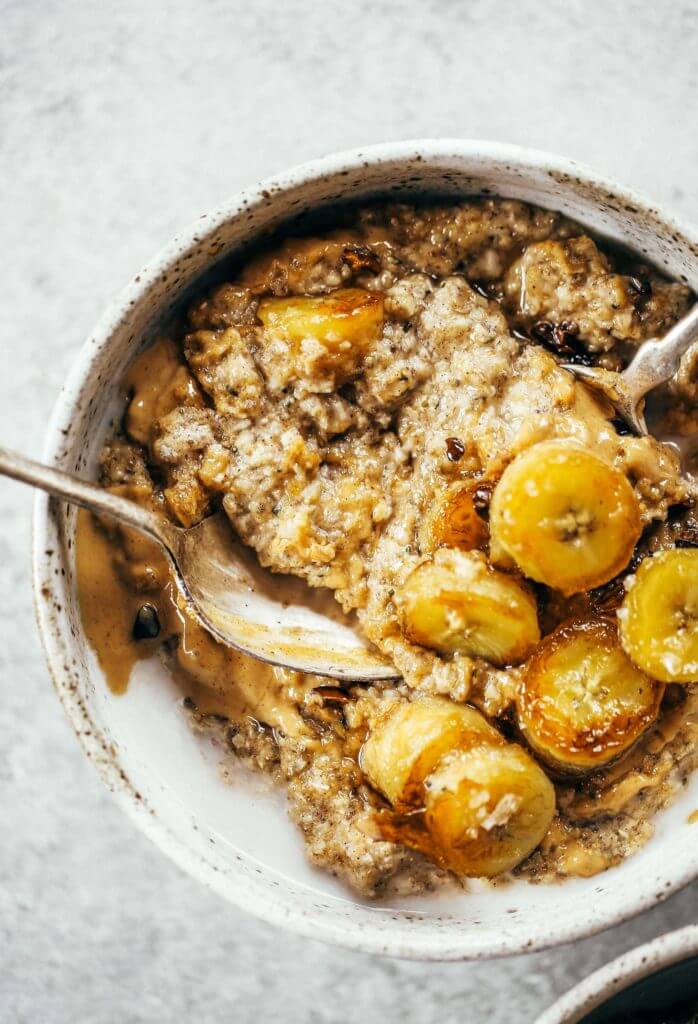 Warm and toasty Paleo banana cereal. Made with caramelized bananas, chia seeds, golden flax, hemp, and coconut. This grain free cereal tastes like oatmeal and is topped with my favorite caramelized bananas! Paleo, gluten free, healthy. Whole30 breakfast recipe. Easy paleo breakfast ideas. Whole30 breakfast ideas. paleo cereal recipe. whole30 meal plan.h. Whole30 meal planning. Whole30 meal prep. Healthy paleo meals. Healthy Whole30 recipes. Easy Whole30 recipes.