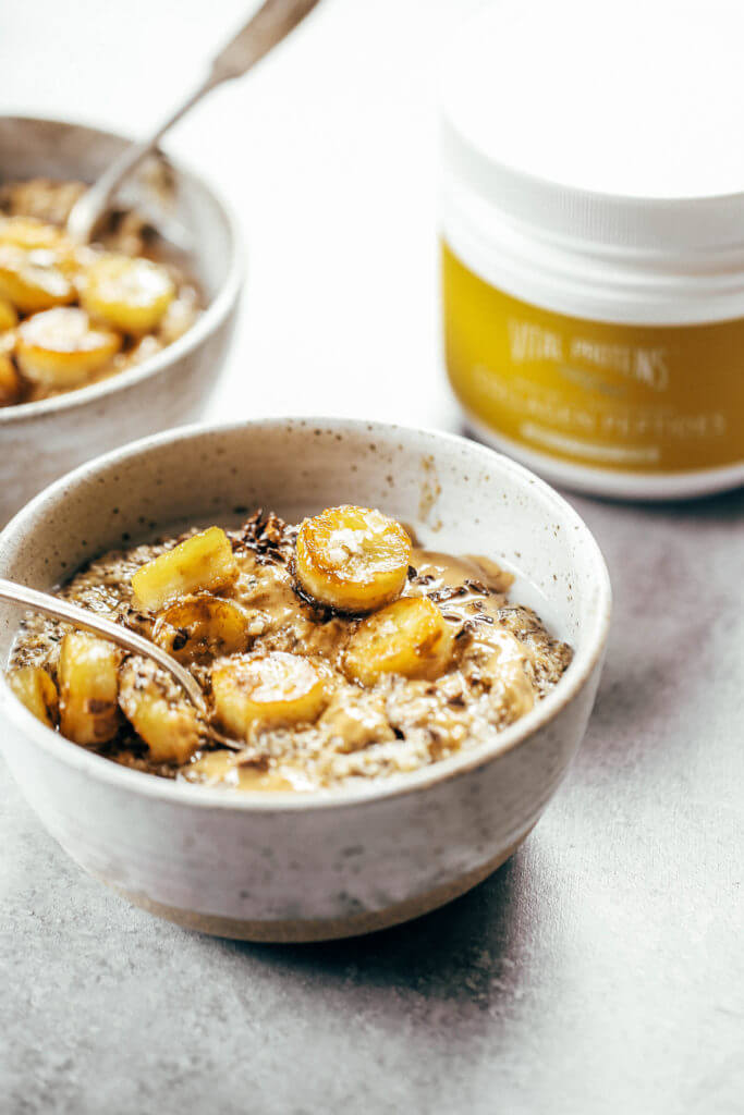 Warm and toasty Paleo banana cereal. Made with caramelized bananas, chia seeds, golden flax, hemp, and coconut. This grain free cereal tastes like oatmeal and is topped with my favorite caramelized bananas! Paleo, gluten free, healthy. Whole30 breakfast recipe. Easy paleo breakfast ideas. Whole30 breakfast ideas. paleo cereal recipe. whole30 meal plan.h. Whole30 meal planning. Whole30 meal prep. Healthy paleo meals. Healthy Whole30 recipes. Easy Whole30 recipes.