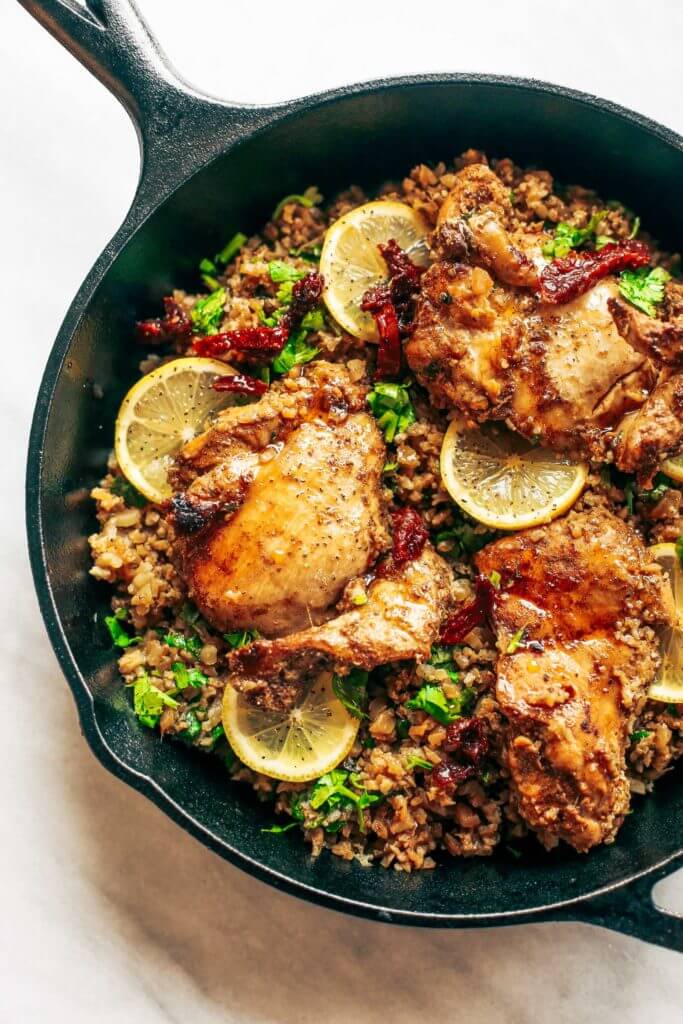 One pan Spanish cauliflower rice made in 25 minutes! Bursting with flavor! Paleo and whole30 friendly. Made with lemon, cilantro, chicken, and cauliflower rice. This one-pan skillet recipe makes for fast and easy meal prep that tastes delicious! whole30 meal plan. Easy whole30 dinner recipes. Easy whole30 dinner recipes. Whole30 recipes. Whole30 lunch. Whole30 meal planning. Whole30 meal prep. Healthy paleo meals. Healthy Whole30 recipes. Easy Whole30 recipes. Easy whole30 dinner recipes.