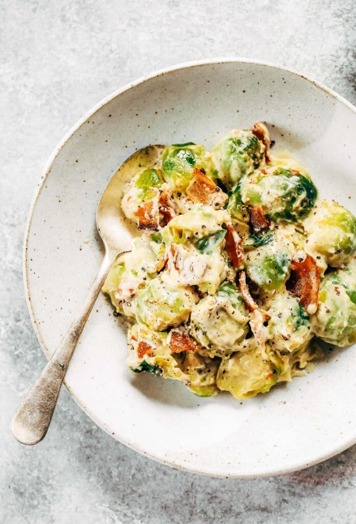 Creamy bacon brussel sprouts in cauliflower cream sauce! This dish is outstanding all on it’s own or can be paired with another side of greens. It’s a family favorite! Gluten free, dairy free, paleo, and whole30. Easy whole30 dinner recipes. Whole30 recipes. Whole30 lunch. Whole30 recipes just for you. Whole30 meal planning. Whole30 meal prep. Healthy paleo meals. Healthy Whole30 recipes. Easy Whole30 recipes.