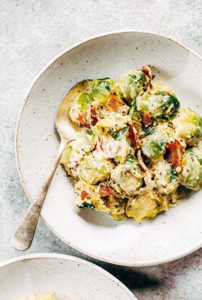 Creamy bacon brussel sprouts in cauliflower cream sauce! This dish is outstanding all on it’s own or can be paired with another side of greens. It’s a family favorite! Gluten free, dairy free, paleo, and whole30. Easy whole30 dinner recipes. Whole30 recipes. Whole30 lunch. Whole30 recipes just for you. Whole30 meal planning. Whole30 meal prep. Healthy paleo meals. Healthy Whole30 recipes. Easy Whole30 recipes.