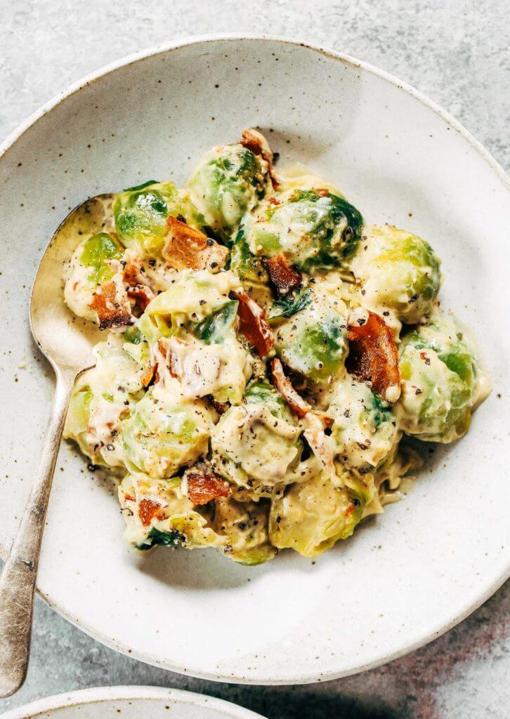 Creamy bacon brussel sprouts in cauliflower cream sauce! This dish is outstanding all on it’s own or can be paired with another side of greens. It’s a family favorite! Gluten free, dairy free, paleo, and whole30. Easy whole30 dinner recipes. Whole30 recipes. Whole30 lunch. Whole30 recipes just for you. Whole30 meal planning. Whole30 meal prep. Healthy paleo meals. Healthy Whole30 recipes. Easy Whole30 recipes.