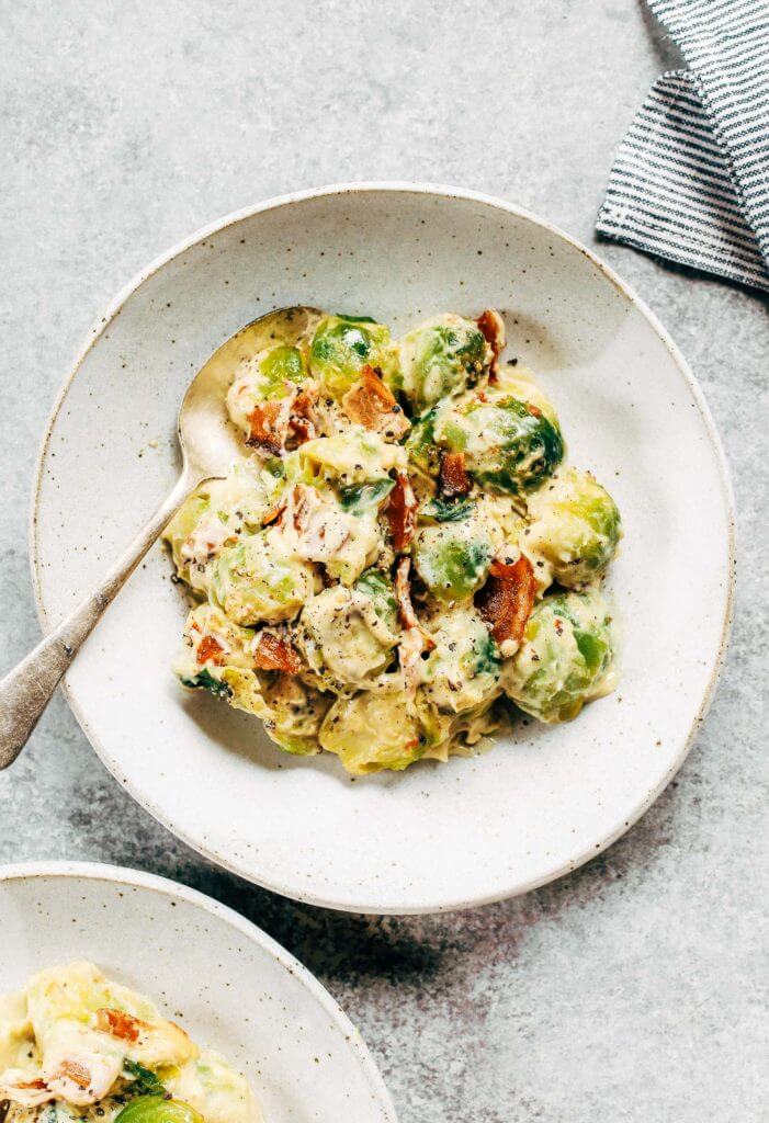 Creamy bacon brussel sprouts in cauliflower cream sauce! This dish is outstanding all on it’s own or can be paired with another side of greens. It’s a family favorite! Gluten free, dairy free, paleo, and whole30. Easy whole30 dinner recipes. Whole30 recipes. Whole30 lunch. Whole30 recipes just for you. Whole30 meal planning. Whole30 meal prep. Healthy paleo meals. Healthy Whole30 recipes. Easy Whole30 recipes.