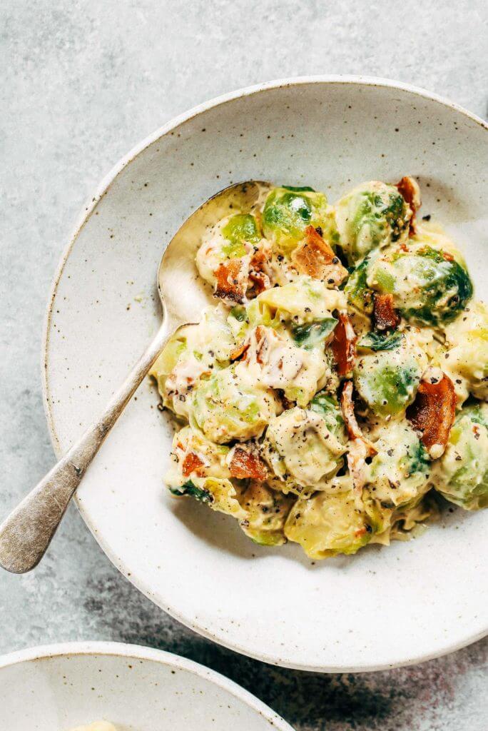 Creamy bacon brussel sprouts in cauliflower cream sauce! This dish is outstanding all on it’s own or can be paired with another side of greens. It’s a family favorite! Gluten free, dairy free, paleo, and whole30. Easy whole30 dinner recipes. Whole30 recipes. Whole30 lunch. Whole30 recipes just for you. Whole30 meal planning. Whole30 meal prep. Healthy paleo meals. Healthy Whole30 recipes. Easy Whole30 recipes.