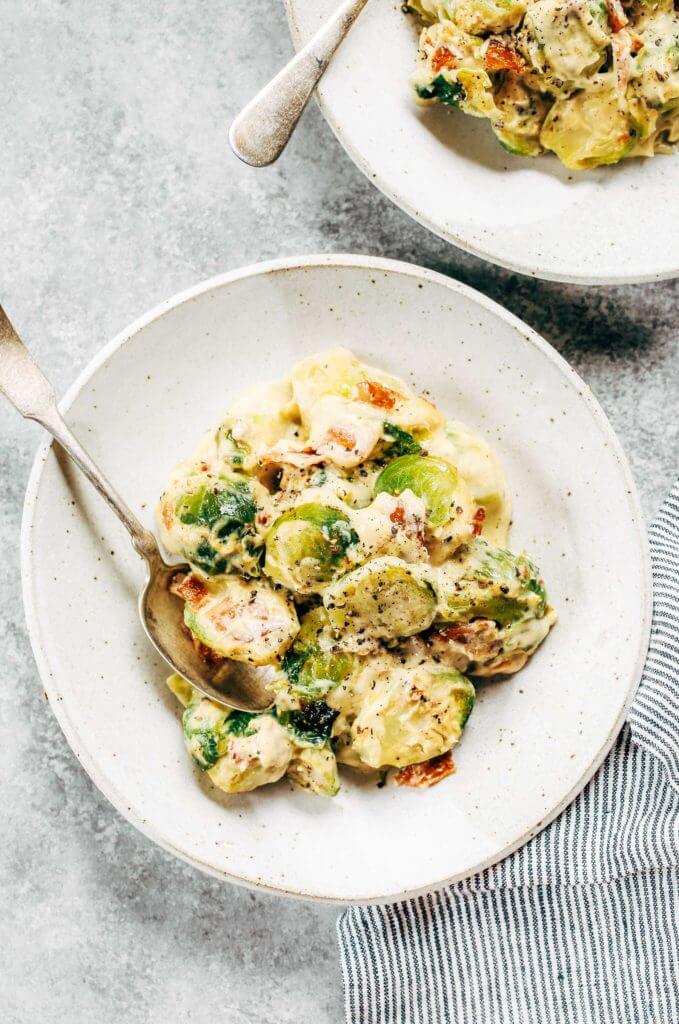 Creamy bacon brussel sprouts in cauliflower cream sauce! This dish is outstanding all on it’s own or can be paired with another side of greens. It’s a family favorite! Gluten free, dairy free, paleo, and whole30. Easy whole30 dinner recipes. Whole30 recipes. Whole30 lunch. Whole30 recipes just for you. Whole30 meal planning. Whole30 meal prep. Healthy paleo meals. Healthy Whole30 recipes. Easy Whole30 recipes.