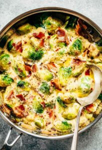 Creamy bacon brussel sprouts in cauliflower cream sauce! This dish is outstanding all on it’s own or can be paired with another side of greens. It’s a family favorite! Gluten free, dairy free, paleo, and whole30. Easy whole30 dinner recipes. Whole30 recipes. Whole30 lunch. Whole30 recipes just for you. Whole30 meal planning. Whole30 meal prep. Healthy paleo meals. Healthy Whole30 recipes. Easy Whole30 recipes.