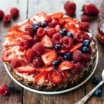 This no bake fruit tart is filled with creamy banana filling and a secret ingredient: cauliflower! Easy, healthy, and made in 5 minutes! Paleo pie recipes. Paleo crust recipes. Summer pie fruit recipes. Easy summer dresses. Easy summer snacks. Healthy snacks. Easy paleo dessert recipes. Best paleo pie recipe. Strawberry dessert recipes.