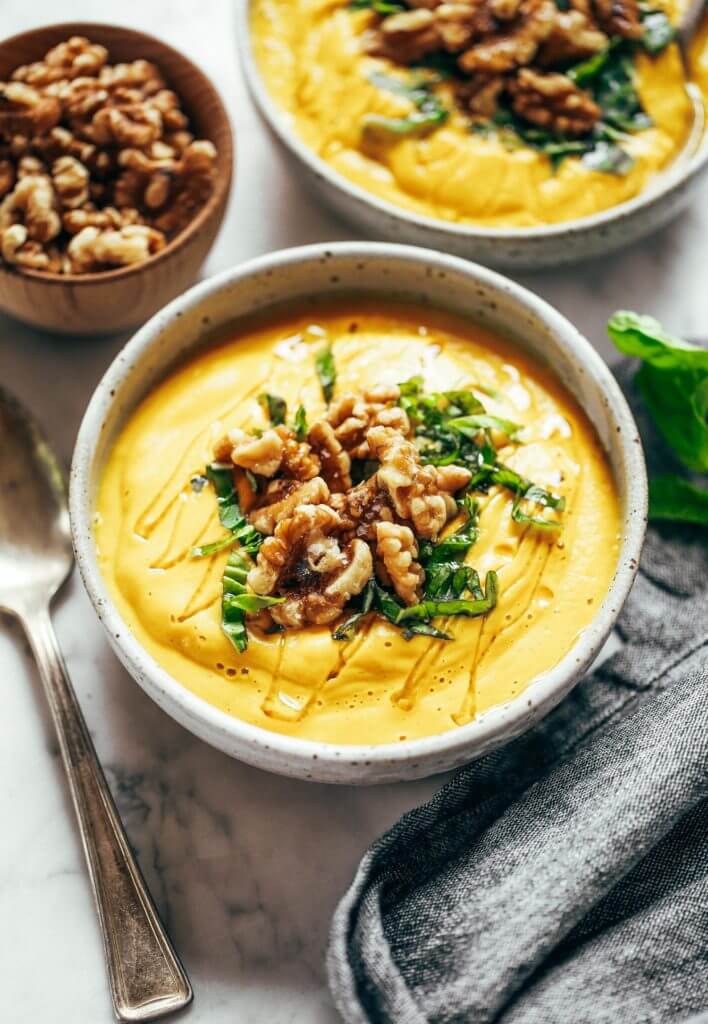 Creamy golden turmeric vegetable soup; made with vegetables, cashews, and curry spices! A warm and comforting paleo whole30 dinner recipe, full of rich earthy flavors. Whole30 easy recipes. Easy whole30 dinners. Whole30 trader joes recipes. Whole30 dinner meal planning. Easy whole30 soup. Paleo for beginners. Paleo diet recipes. Paleo dinner ideas.