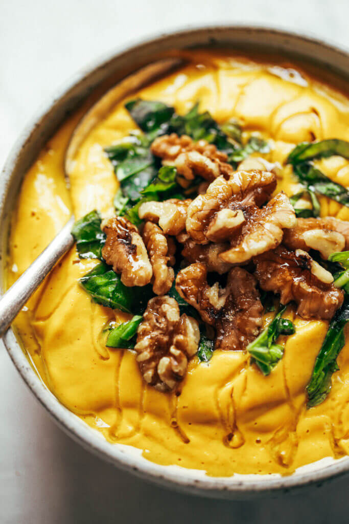 Creamy golden turmeric vegetable soup; made with vegetables, cashews, and curry spices! A warm and comforting paleo whole30 dinner recipe, full of rich earthy flavors. Whole30 easy recipes. Easy whole30 dinners. Whole30 trader joes recipes. Whole30 dinner meal planning. Easy whole30 soup. Paleo for beginners. Paleo diet recipes. Paleo dinner ideas.