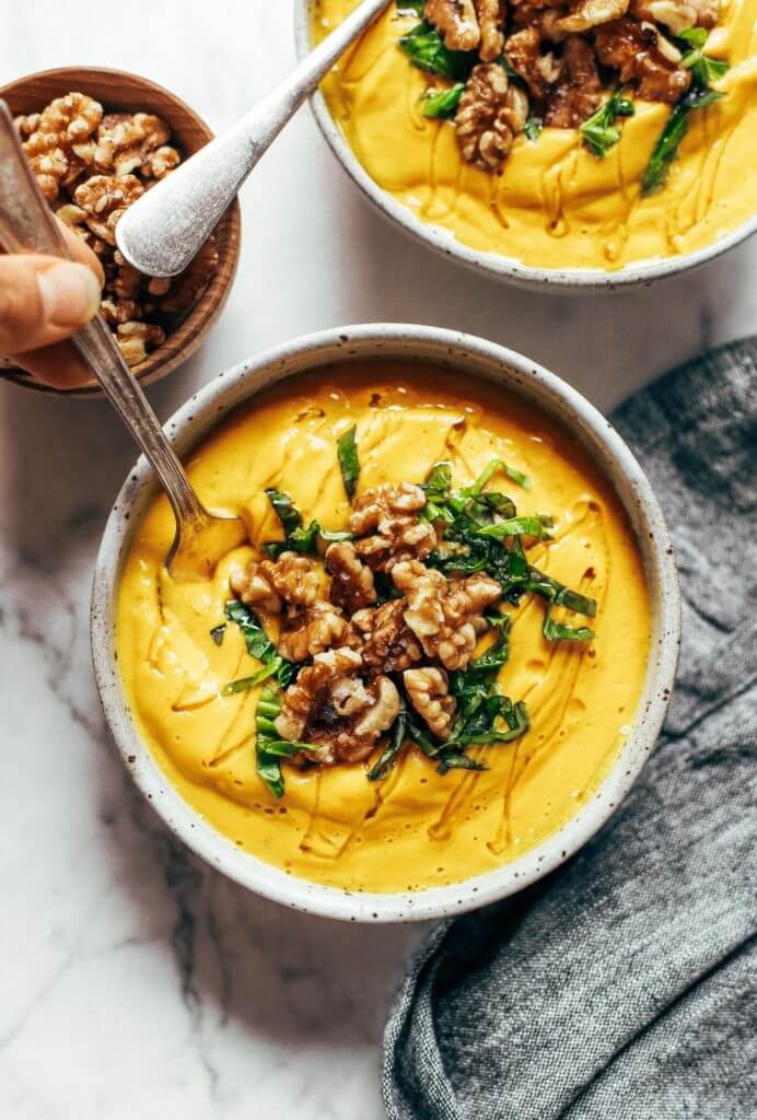 Creamy golden turmeric vegetable soup; made with vegetables, cashews, and curry spices! A warm and comforting paleo whole30 dinner recipe, full of rich earthy flavors. Whole30 easy recipes. Easy whole30 dinners. Whole30 trader joes recipes. Whole30 dinner meal planning. Easy whole30 soup. Paleo for beginners. Paleo diet recipes. Paleo dinner ideas.