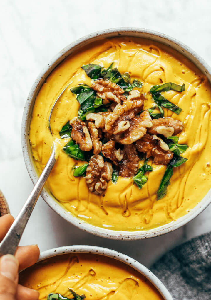 Creamy golden turmeric vegetable soup; made with vegetables, cashews, and curry spices! A warm and comforting paleo whole30 dinner recipe, full of rich earthy flavors. Whole30 easy recipes. Easy whole30 dinners. Whole30 trader joes recipes. Whole30 dinner meal planning. Easy whole30 soup. Paleo for beginners. Paleo diet recipes. Paleo dinner ideas.