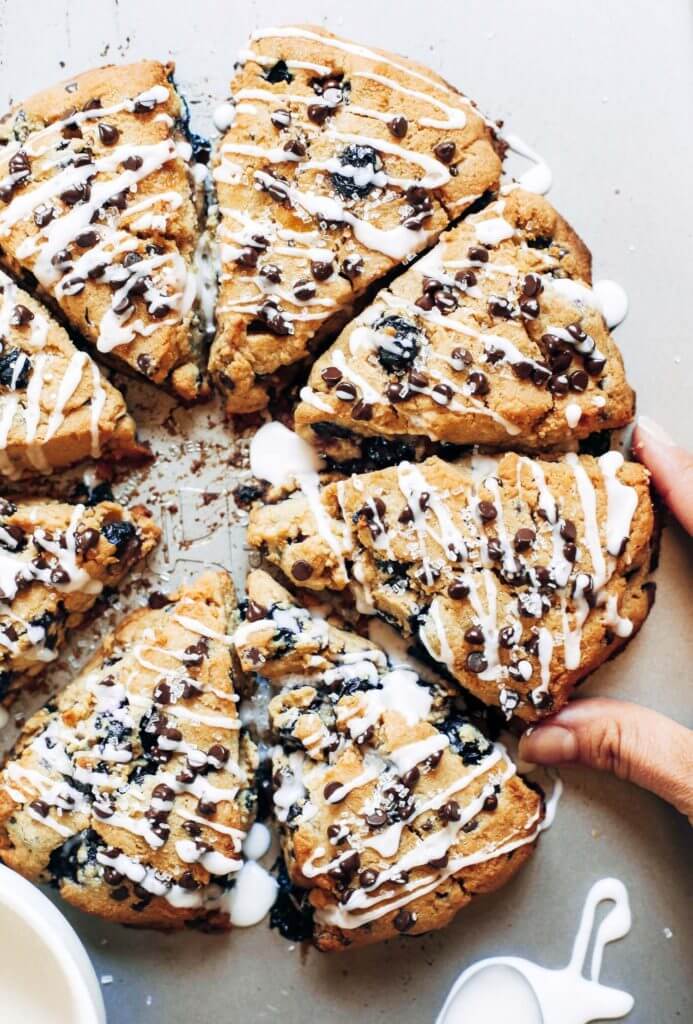 Easy paleo gluten free breakfast scones with blueberries, lemon zest, and chocolate chips. Healthy almond flour paleo scone recipe. An easy paleo breakfast on the go! #paleo #scones #paleodessert #healthydessert #blueberries #fruit #breakfast Paleo for beginners. Paleo diet recipes. Paleo dessert recipes. Easy Paleo breakfast recipes. Paleo snacks. Paleo recipes for weight loss. Gluten free scones. Best gluten free desserts. Easy gluten free desserts.