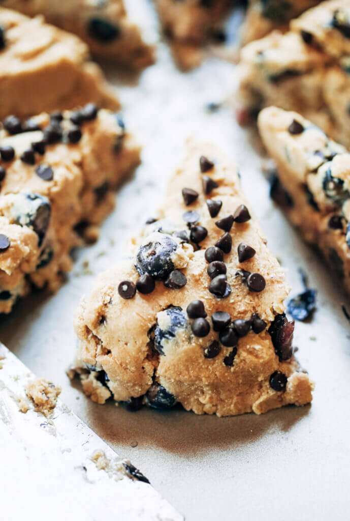 Easy paleo gluten free breakfast scones with blueberries, lemon zest, and chocolate chips. Healthy almond flour paleo scone recipe. An easy paleo breakfast on the go! #paleo #scones #paleodessert #healthydessert #blueberries #fruit #breakfast Paleo for beginners. Paleo diet recipes. Paleo dessert recipes. Easy Paleo breakfast recipes. Paleo snacks. Paleo recipes for weight loss. Gluten free scones. Best gluten free desserts. Easy gluten free desserts.