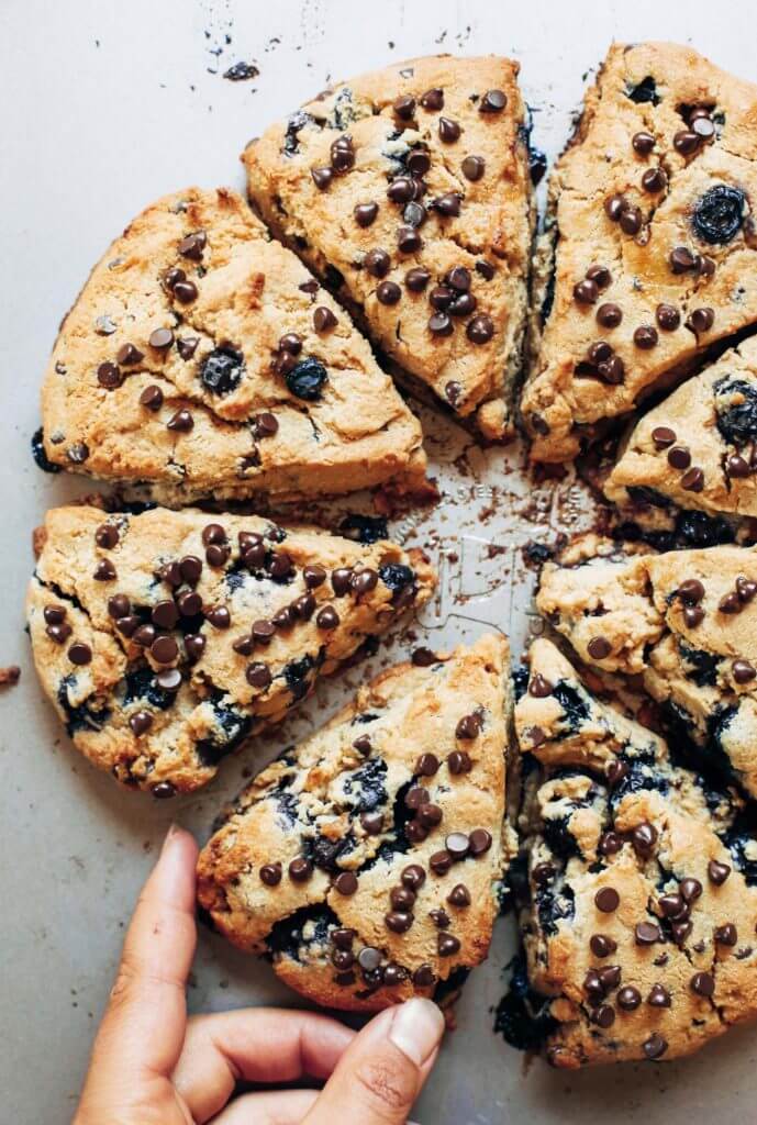 Easy paleo gluten free breakfast scones with blueberries, lemon zest, and chocolate chips. Healthy almond flour paleo scone recipe. An easy paleo breakfast on the go! #paleo #scones #paleodessert #healthydessert #blueberries #fruit #breakfast Paleo for beginners. Paleo diet recipes. Paleo dessert recipes. Easy Paleo breakfast recipes. Paleo snacks. Paleo recipes for weight loss. Gluten free scones. Best gluten free desserts. Easy gluten free desserts.