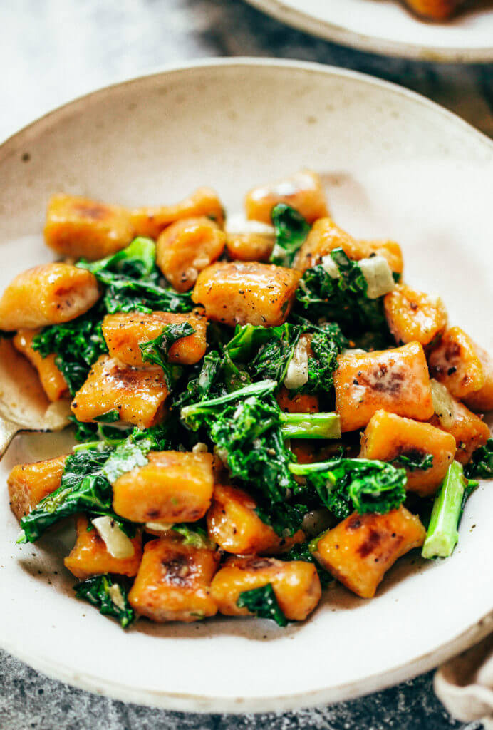 Easy paleo sweet potato gnocchi served with kale sage sauce. Delicious, healthy, family meal. Soft pillowy gnocchi made with sweet potato. Easy whole30 dinner recipes. Easy whole30 dinner recipes. Whole30 recipes. Whole30 lunch. Whole30 meal planning. Whole30 meal prep. Healthy paleo meals. Healthy Whole30 recipes. Easy Whole30 recipes. Easy whole30 dinner recipes.