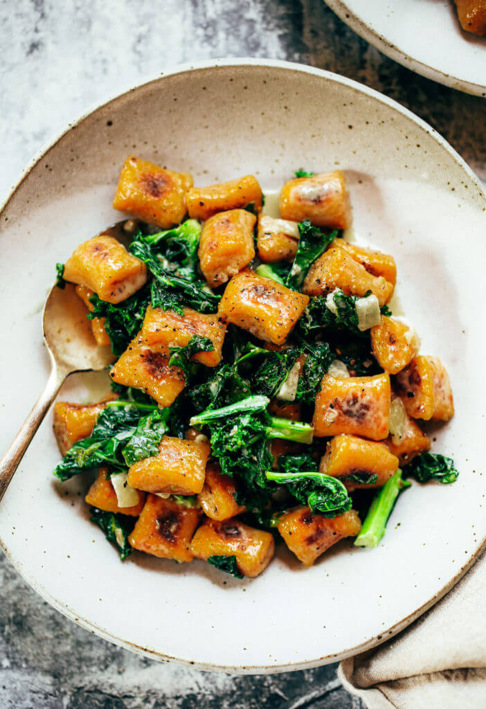 Easy paleo sweet potato gnocchi served with kale sage sauce. Delicious, healthy, family meal. Soft pillowy gnocchi made with sweet potato. Easy whole30 dinner recipes. Easy whole30 dinner recipes. Whole30 recipes. Whole30 lunch. Whole30 meal planning. Whole30 meal prep. Healthy paleo meals. Healthy Whole30 recipes. Easy Whole30 recipes. Easy whole30 dinner recipes.