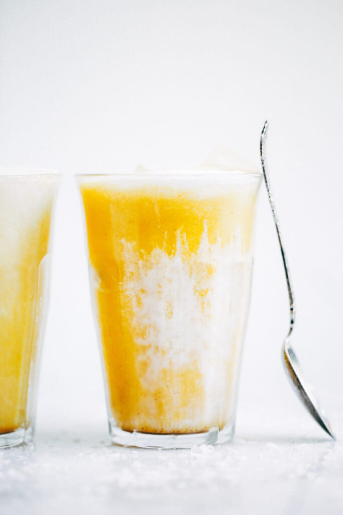 Top on my paleo food list: golden iced turmeric lattes. Tastes like liquid sunshine! An easy refreshing paleo and whole30 beverage, perfect for summer. #paleo #summer #golden Paleo for beginners. Paleo diet recipes. Paleo breakfast on the go. Easy paleo snacks. Best golden milk latte. Whole30 breakfast recipes. Whole30 rules. Whole30 snacks.