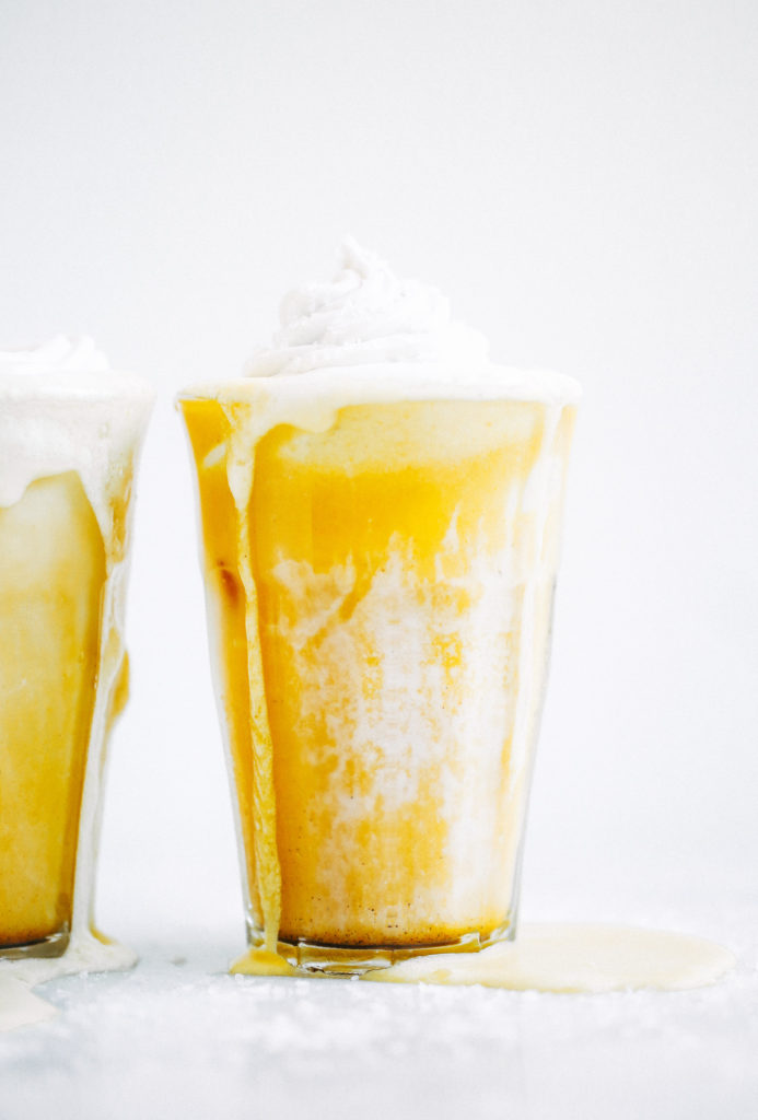 Top on my paleo food list: golden iced turmeric lattes. Tastes like liquid sunshine! An easy refreshing paleo and whole30 beverage, perfect for summer. #paleo #summer #golden Paleo for beginners. Paleo diet recipes. Paleo breakfast on the go. Easy paleo snacks. Best golden milk latte. Whole30 breakfast recipes. Whole30 rules. Whole30 snacks.