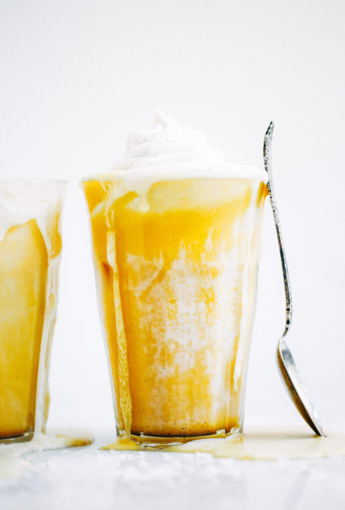 Top on my paleo food list: golden iced turmeric lattes. Tastes like liquid sunshine! An easy refreshing paleo and whole30 beverage, perfect for summer. #paleo #summer #golden Paleo for beginners. Paleo diet recipes. Paleo breakfast on the go. Easy paleo snacks. Best golden milk latte. Whole30 breakfast recipes. Whole30 rules. Whole30 snacks.