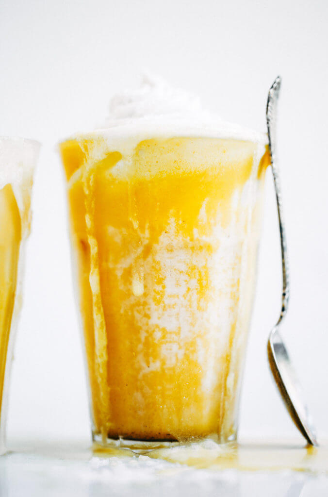 Top on my paleo food list: golden iced turmeric lattes. Tastes like liquid sunshine! An easy refreshing paleo and whole30 beverage, perfect for summer. #paleo #summer #golden Paleo for beginners. Paleo diet recipes. Paleo breakfast on the go. Easy paleo snacks. Best golden milk latte. Whole30 breakfast recipes. Whole30 rules. Whole30 snacks.