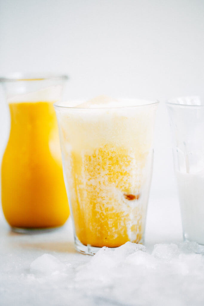 Top on my paleo food list: golden iced turmeric lattes. Tastes like liquid sunshine! An easy refreshing paleo and whole30 beverage, perfect for summer. #paleo #summer #golden Paleo for beginners. Paleo diet recipes. Paleo breakfast on the go. Easy paleo snacks. Best golden milk latte. Whole30 breakfast recipes. Whole30 rules. Whole30 snacks.