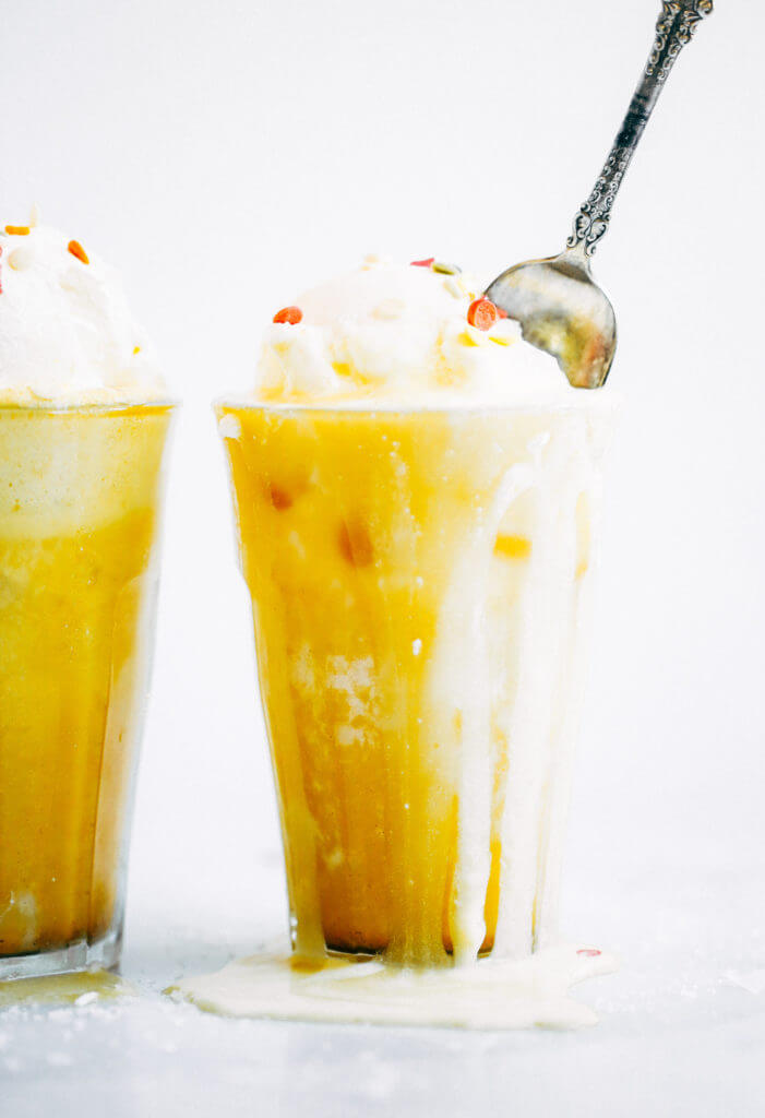 Top on my paleo food list: golden iced turmeric lattes. Tastes like liquid sunshine! An easy refreshing paleo and whole30 beverage, perfect for summer. #paleo #summer #golden Paleo for beginners. Paleo diet recipes. Paleo breakfast on the go. Easy paleo snacks. Best golden milk latte. Whole30 breakfast recipes. Whole30 rules. Whole30 snacks.