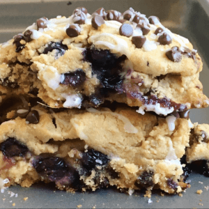 Paleo bakery style blueberry chocolate chip scones. 1/4 cup coconut sugar 1/4 cup coconut oil 1/4 cup palm oil shortening 1/2 cup full fat canned coconut milk 1 large egg 1 tablespoon lemon zest 1 teaspoon baking powder 1/2 teaspoon sea salt 1 cup blueberries 1/3 cup mini chocolate chips optional Recipe link in bio#paleo #breakfast #fruit #blueberries paleo breakfast paleo gluten free scone recipe