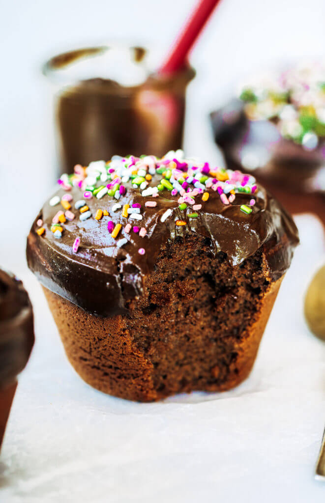 Fluffy paleo chocolate cupcakes made in the blender in 5 minutes! These chocolate cupcakes are made with healthy ingredients, avocado buttercream, and natural sprinkles! #paleo #chocolate #cupcakes #healthydessert #glutenfree #cake Paleo chocolate cupcakes recipes. Chocolate cupcakes from scratch.