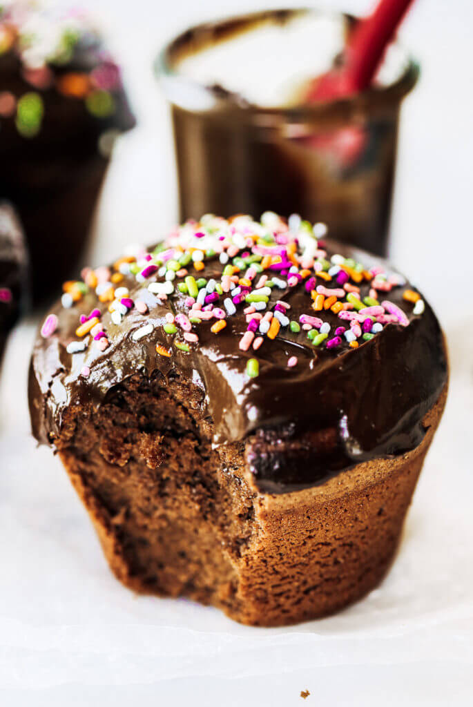 Fluffy paleo chocolate cupcakes made in the blender in 5 minutes! These chocolate cupcakes are made with healthy ingredients, avocado buttercream, and natural sprinkles! #paleo #chocolate #cupcakes #healthydessert #glutenfree #cake Paleo chocolate cupcakes recipes. Chocolate cupcakes from scratch.