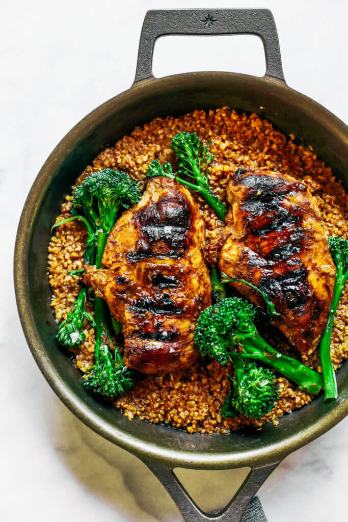 Easy thai chicken cauliflower rice. A delicious healthy, whole30, and paleo family meal. You can even make this dish ahead of time, freeze it, and eat later! Easy whole30 meal prep. Paleo lunch. Paleo chicken dinner. Whole30 dinner and lunch.