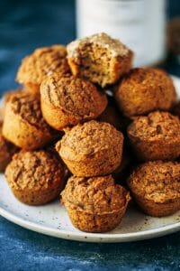 51 calorie banana muffins made with sweet potatoes instead of flour! Healthy paleo banana bread muffins make easy paleo breakfasts for on the go. Kid friendly paleo snack idea. #paleo #sugarfree #bananas #bananabread #baking #glutenfree