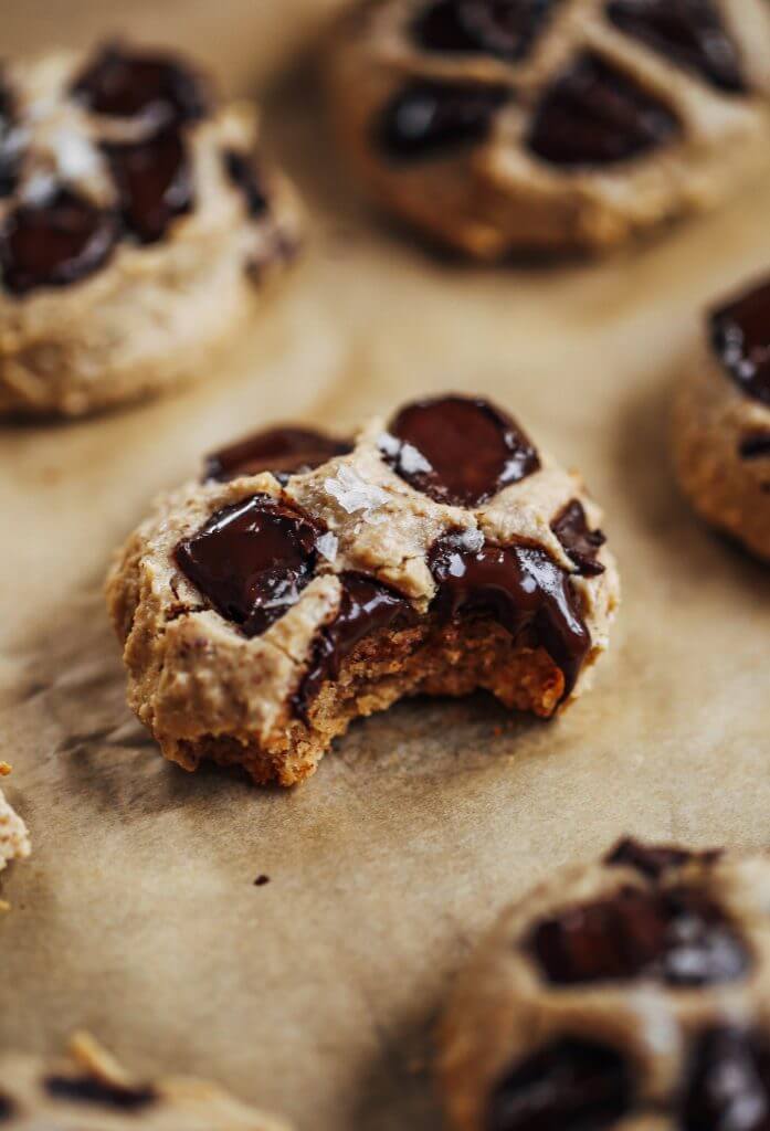 Low sugar cookies made with only 3 tablespoons maple syrup! Healthier almond flour chocolate chip cookies. Easy paleo cookies made with almond flour, the whole family will love! #cookies #paleo #baking #glutenfree