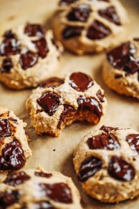 Low sugar cookies made with only 3 tablespoons maple syrup! Healthier almond flour chocolate chip cookies. Easy paleo cookies made with almond flour, the whole family will love! #cookies #paleo #baking #glutenfree