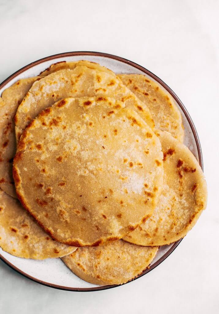Two ingredient paleo cauliflower tortillas! Life-changing recipe for low calorie gluten free tortillas, ready in minutes! These tortillas have 42 calories and are loaded with veggies to keep you healthy and satisfied. Delicious, easy, and mind-blowing-easy recipe for homemade tortillas. #paleo #recipes #cooking #healthy