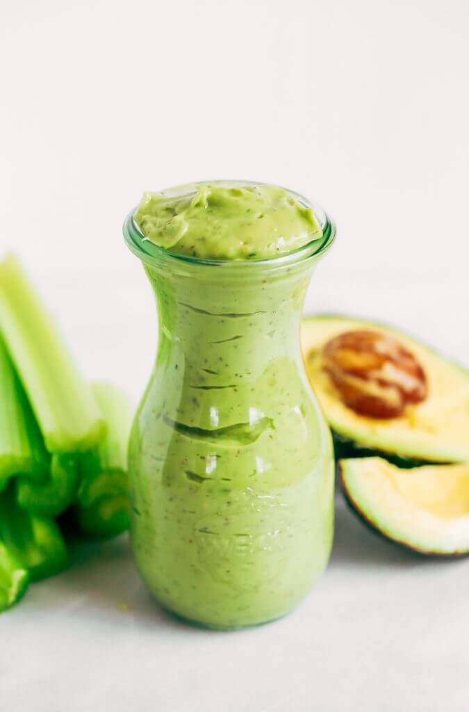 Whole30 paleo ranch dressing made with avocados instead of oil! Easy five minute ranch dressing. This dairy free ranch dressing can be used as a salad dressing, veggie dip, or spread for sandwiches and burgers. #paleo #whole30 #avocado