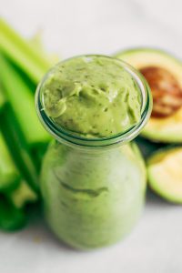 Whole30 paleo ranch dressing made with avocados instead of oil! Easy five minute ranch dressing. This dairy free ranch dressing can be used as a salad dressing, veggie dip, or spread for sandwiches and burgers. #paleo #whole30 #avocado