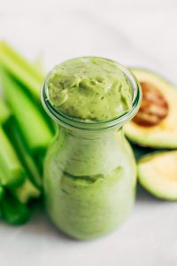 Whole30 paleo ranch dressing made with avocados instead of oil! Easy five minute ranch dressing. This dairy free ranch dressing can be used as a salad dressing, veggie dip, or spread for sandwiches and burgers. #paleo #whole30 #avocado