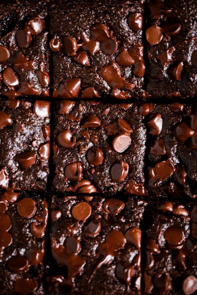 Easy homemade brownies with a fudgey middle and crispy delicious corners. These gluten free brownies are family favorites- filled with rich chocolate flavor and made with healthy ingredients! Best flourless brownies made with sweet potato instead of flour! #baking #brownies #dessert #glutenfree