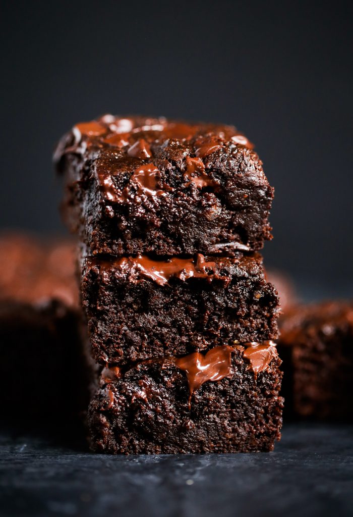 Easy homemade brownies with a fudgey middle and crispy delicious corners. These gluten free brownies are family favorites- filled with rich chocolate flavor and made with healthy ingredients! Best flourless brownies made with sweet potato instead of flour! #baking #brownies #dessert #glutenfree