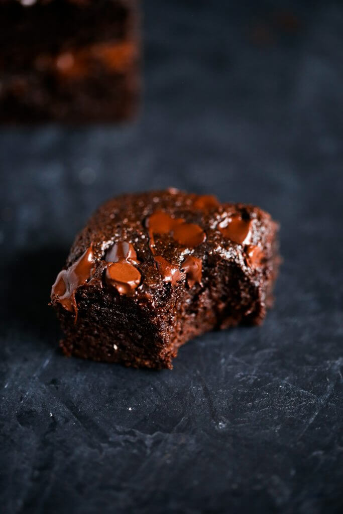 Easy homemade brownies with a fudgey middle and crispy delicious corners. These gluten free brownies are family favorites- filled with rich chocolate flavor and made with healthy ingredients! Best flourless brownies made with sweet potato instead of flour! #baking #brownies #dessert #glutenfree