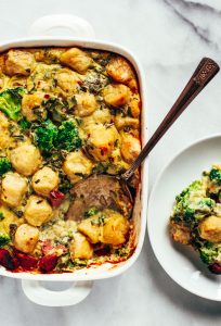 Baked cauliflower gnocchi casserole- made with homemade two ingredient cauliflower gnocchi and rosemary sage cream sauce. Paleo, gluten free, and dairy free family dinner. This casserole is perfect for breakfast or dinner! Easy whole30 dinner recipes. Whole30 meal prep. Best paleo dinners. #paleo